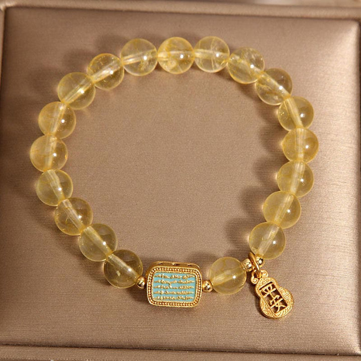 Bracelet de générosité en citrine naturelle et cinq écritures de Buddha Stones