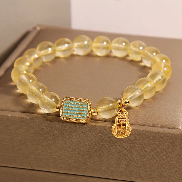 Bracelet de générosité en citrine naturelle et cinq écritures de Buddha Stones