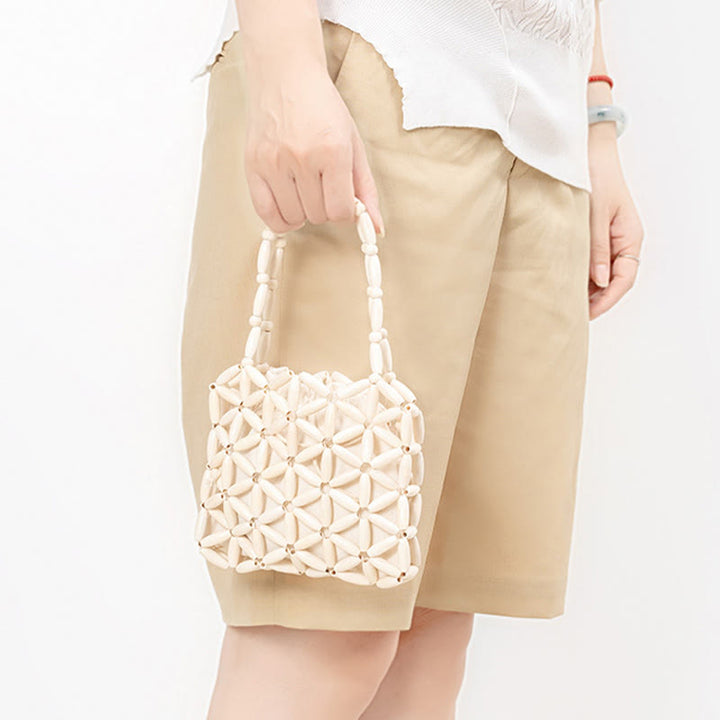 Sac à main en mini perles en bois tissées à la main Buddha Stones