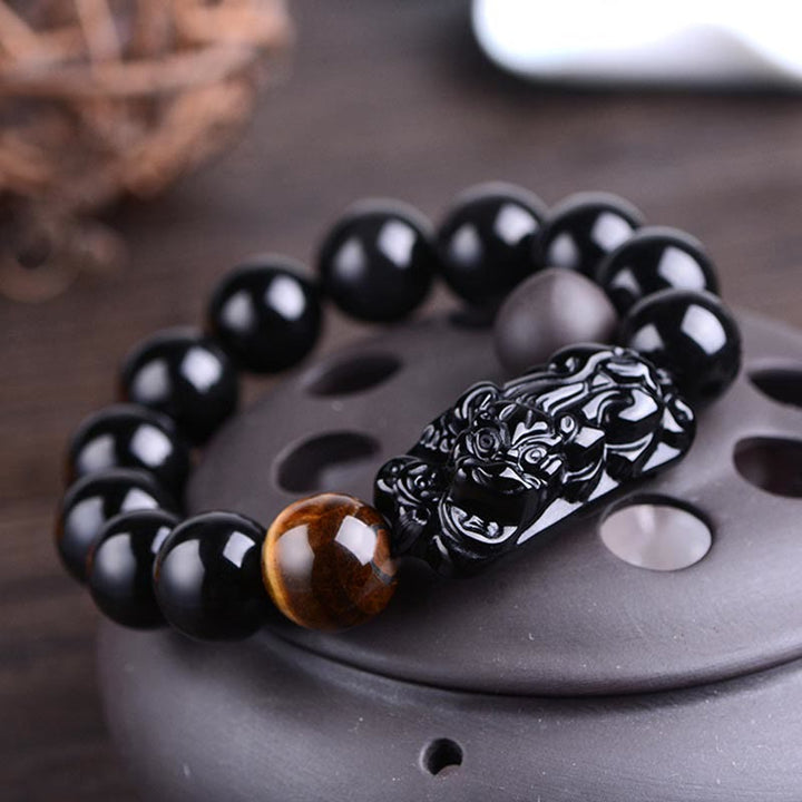 Bracelet de force en obsidienne noire naturelle PiXiu œil de tigre de Buddha Stones