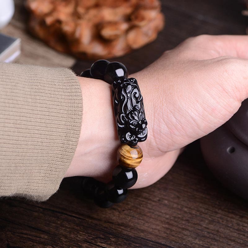 Bracelet de force en obsidienne noire naturelle PiXiu œil de tigre de Buddha Stones