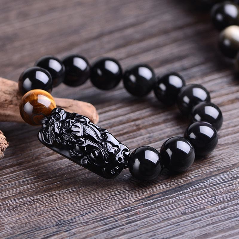 Bracelet de force en obsidienne noire naturelle PiXiu œil de tigre de Buddha Stones
