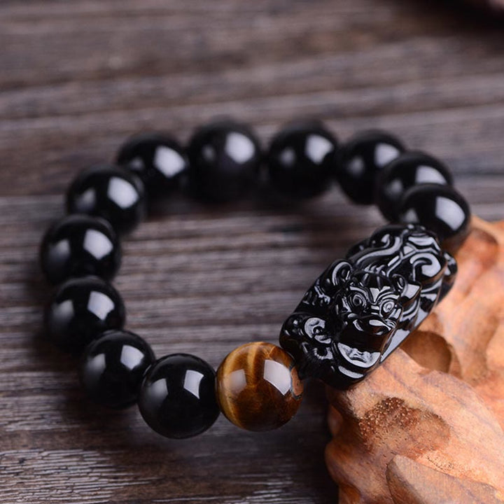Bracelet de force en obsidienne noire naturelle PiXiu œil de tigre de Buddha Stones