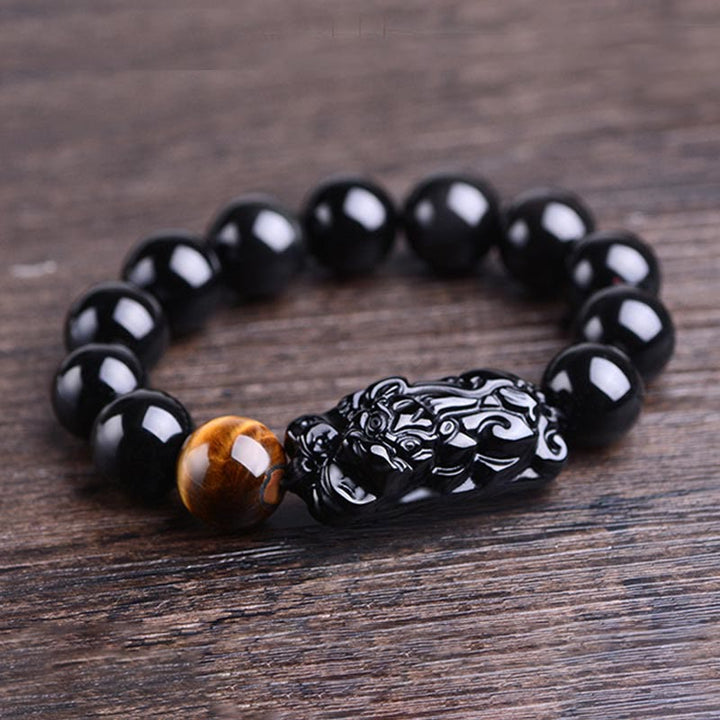 Bracelet de force en obsidienne noire naturelle PiXiu œil de tigre de Buddha Stones
