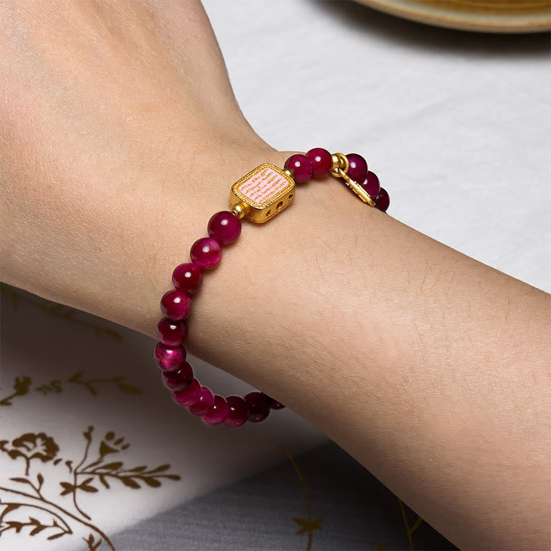 Bracelet de courage avec personnage Fu en œil de tigre rose et rouge Buddha Stones