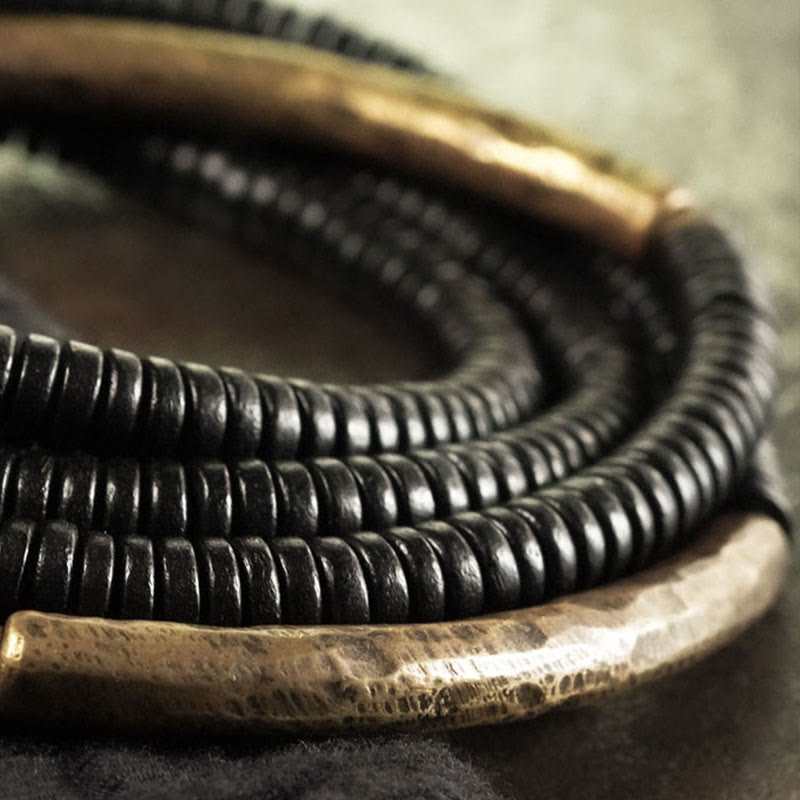 Bracelet multicouche en cuivre avec perles en bois d'ébène tibétain et Buddha Stones