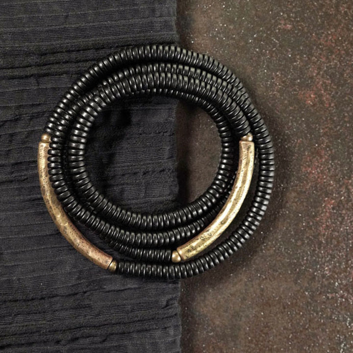 Bracelet multicouche en cuivre avec perles en bois d'ébène tibétain et Buddha Stones