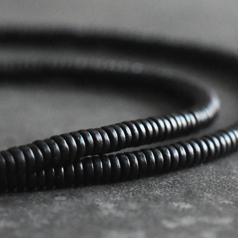 Bracelet multicouche en cuivre avec perles en bois d'ébène tibétain et Buddha Stones