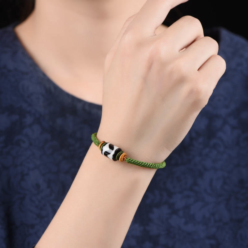 Bracelet de protection en corde verte tressée en perles dzi tibétaines faites à la main avec Buddha Stones
