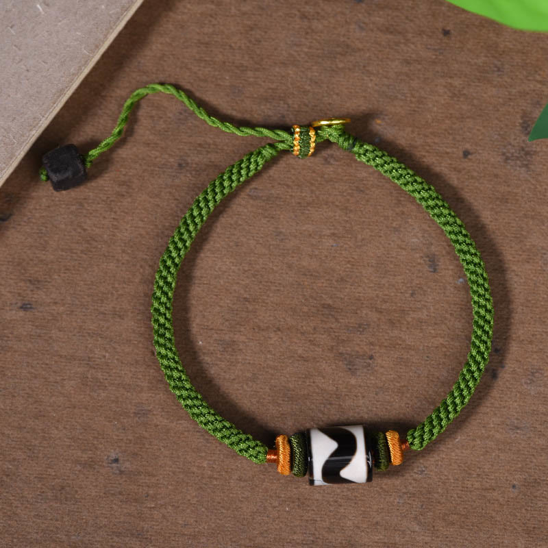 Bracelet de protection en corde verte tressée en perles dzi tibétaines faites à la main avec Buddha Stones