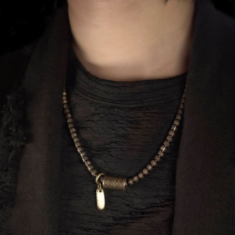 Bracelet multicouche en cuivre et perles en bois d'ébène tibétain avec Buddha Stones