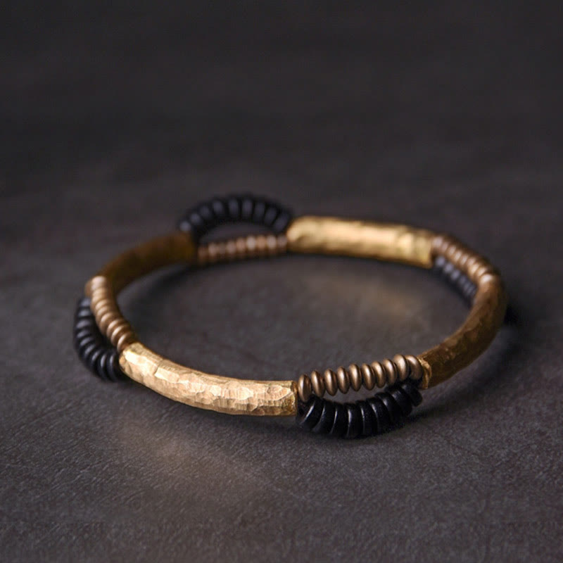 Bracelet fait main en Buddha Stones vintage en bois d'ébène et cuivre pour la chance et la richesse