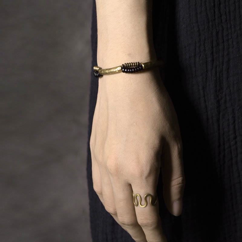Bracelet fait main en Buddha Stones vintage en bois d'ébène et cuivre pour la chance et la richesse