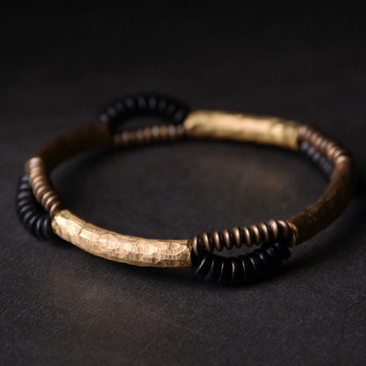 Bracelet fait main en Buddha Stones vintage en bois d'ébène et cuivre pour la chance et la richesse