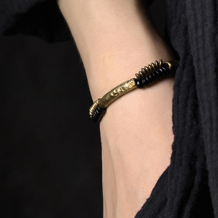 Bracelet fait main en Buddha Stones vintage en bois d'ébène et cuivre pour la chance et la richesse