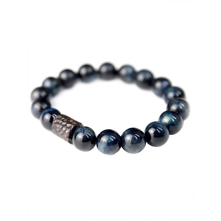 Bracelet calme en perles de bois d'ébène et œil de tigre avec Buddha Stones