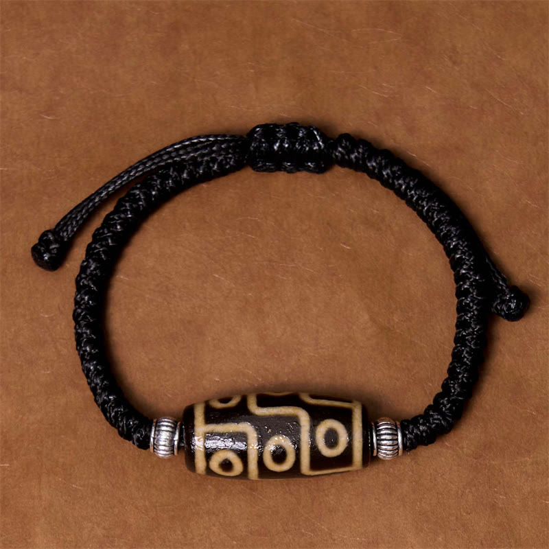Bracelet en corde de protection de richesse Buddha Stones tibétaines à neuf yeux et à trois yeux