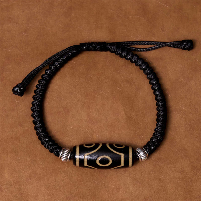 Bracelet en corde de protection de richesse Buddha Stones tibétaines à neuf yeux et à trois yeux