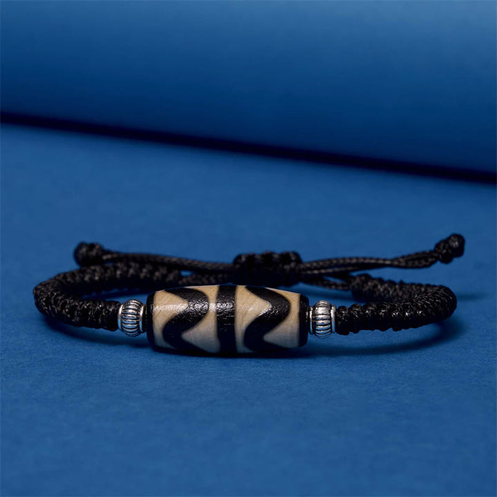 Bracelet en corde de protection de richesse Buddha Stones tibétaines à neuf yeux et à trois yeux