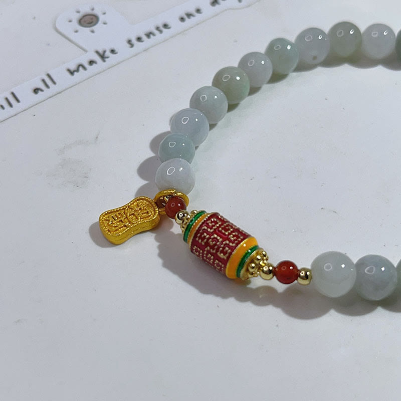 Bracelet tibétain en jade naturel avec Buddha Stones et roue de prières avec personnage Fu pour la prospérité et l'abondance