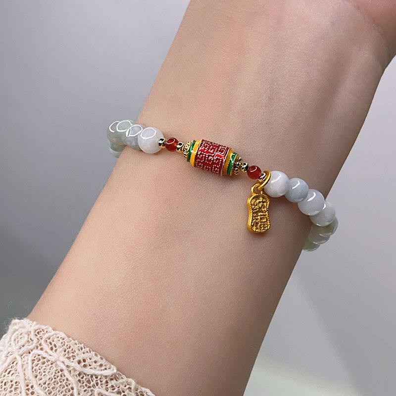 Bracelet tibétain en jade naturel avec Buddha Stones et roue de prières avec personnage Fu pour la prospérité et l'abondance