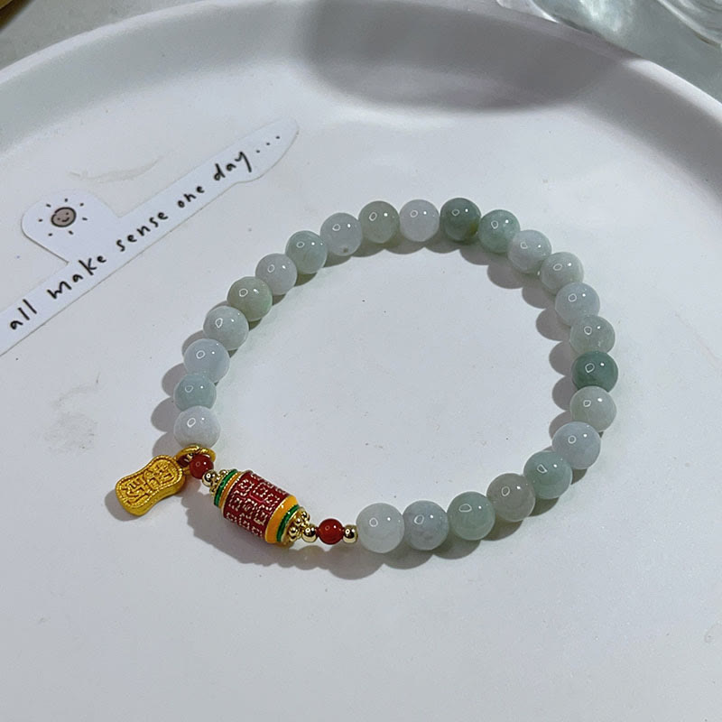 Bracelet tibétain en jade naturel avec Buddha Stones et roue de prières avec personnage Fu pour la prospérité et l'abondance