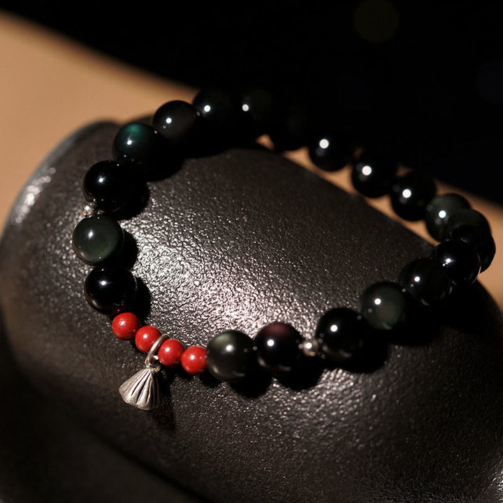 Bracelet de force et d'accomplissement en obsidienne noire naturelle et cinabre avec breloque lotus et Buddha Stones