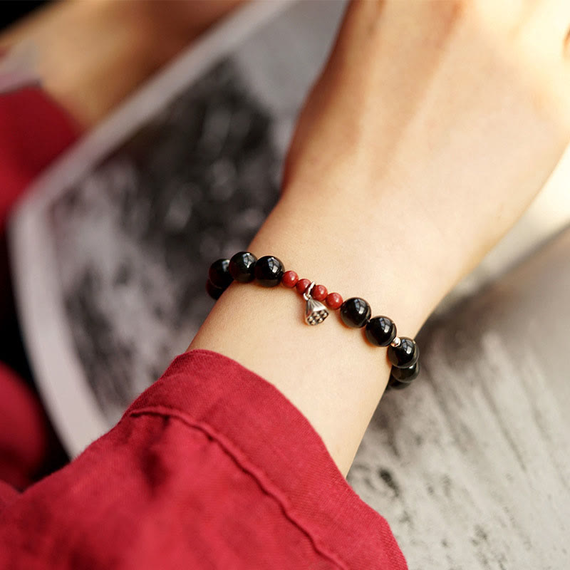 Bracelet de force et d'accomplissement en obsidienne noire naturelle et cinabre avec breloque lotus et Buddha Stones