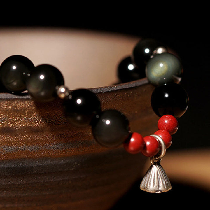 Bracelet de force et d'accomplissement en obsidienne noire naturelle et cinabre avec breloque lotus et Buddha Stones