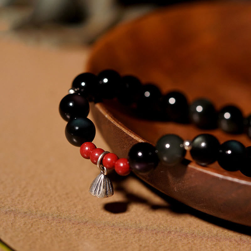 Bracelet de force et d'accomplissement en obsidienne noire naturelle et cinabre avec breloque lotus et Buddha Stones