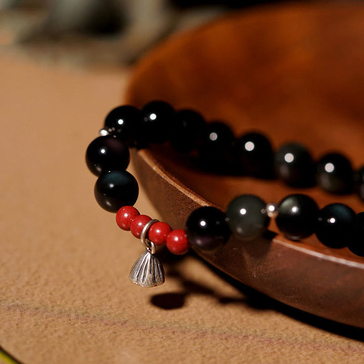 Bracelet de force et d'accomplissement en obsidienne noire naturelle et cinabre avec breloque lotus et Buddha Stones