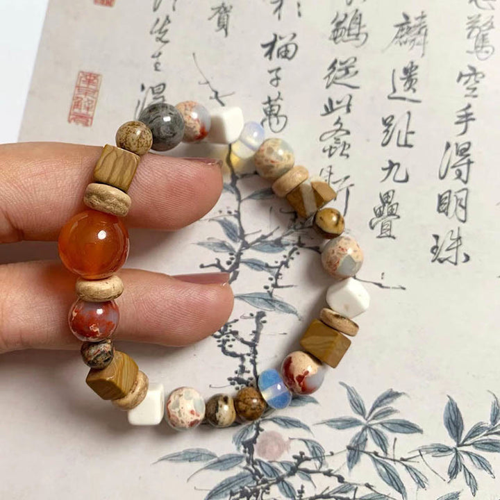 Bracelet de bénédiction calme en Buddha Stones d'agate rouge Shoushan en turquoise blanche
