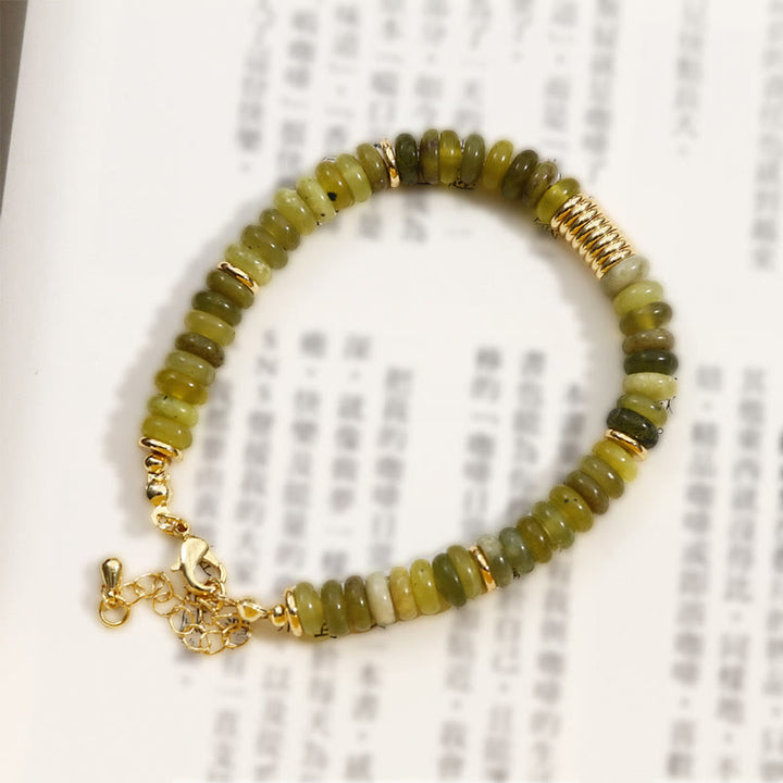 Bracelet de guérison et de réussite en jade cyan doré avec Buddha Stones