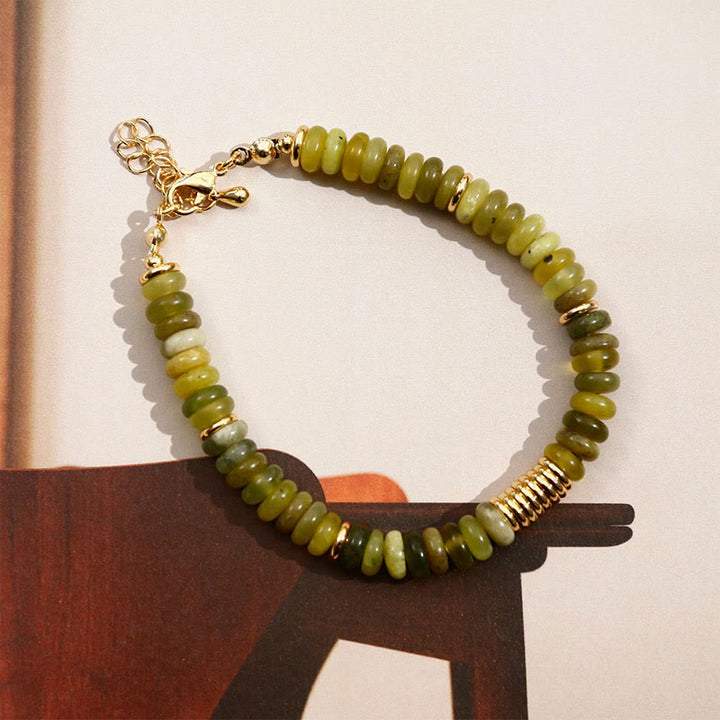 Bracelet de guérison et de réussite en jade cyan doré avec Buddha Stones