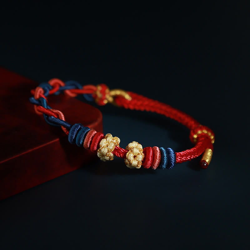 Bracelet de connexion en fleur de pêcher avec quatre Buddha Stones
