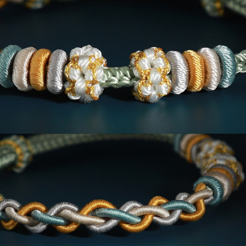 Bracelet de connexion en fleur de pêcher avec quatre Buddha Stones