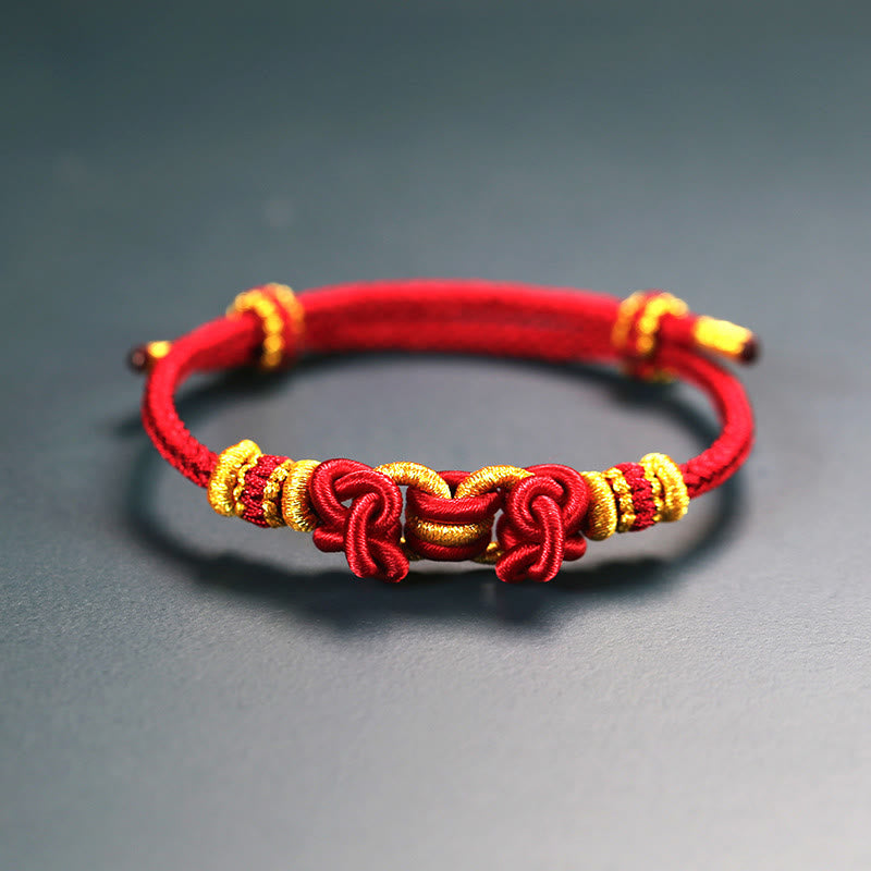 Bracelet de force en corde rouge avec nœud de selle et Buddha Stones