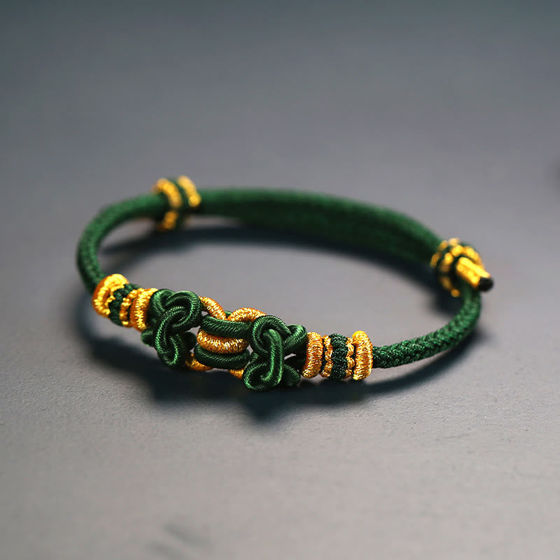 Bracelet de force en corde rouge avec nœud de selle et Buddha Stones