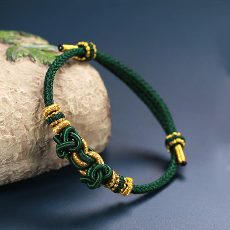 Bracelet de force en corde rouge avec nœud de selle et Buddha Stones