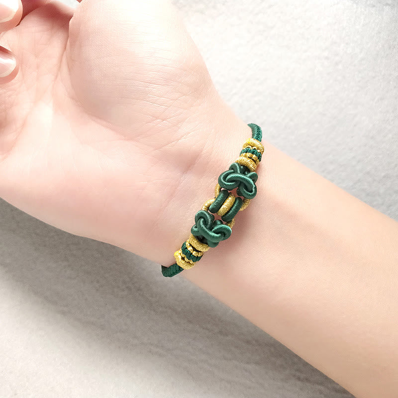 Bracelet de force en corde rouge avec nœud de selle et Buddha Stones