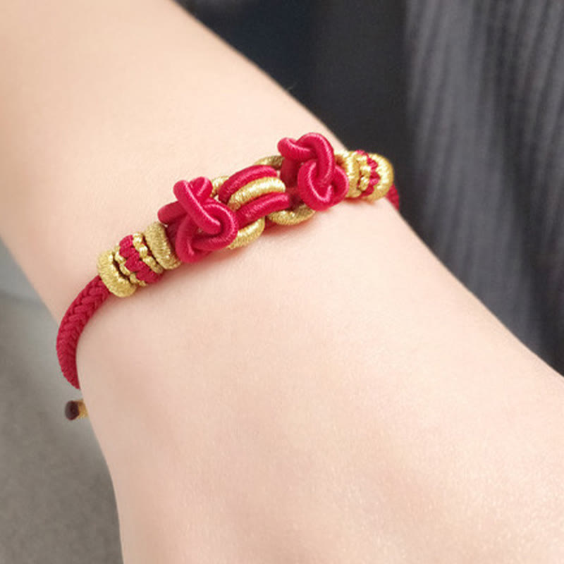 Bracelet de force en corde rouge avec nœud de selle et Buddha Stones