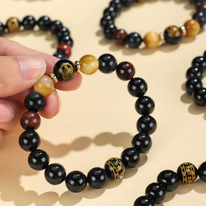 Bracelet de soutien Bouddha Natal en Buddha Stones en onyx noir et œil de tigre Om Mani Padme Hum du zodiaque chinois