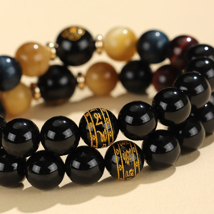 Bracelet de soutien Bouddha Natal en Buddha Stones en onyx noir et œil de tigre Om Mani Padme Hum du zodiaque chinois