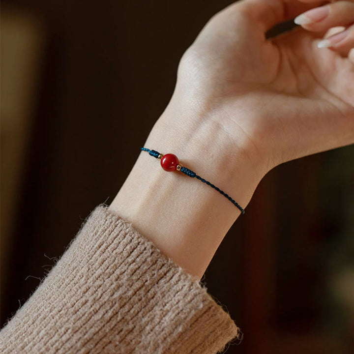 Bracelet de bénédiction en corde et cinabre fait main avec Buddha Stones