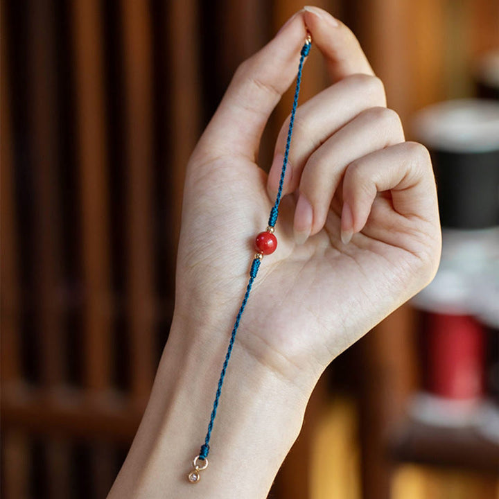Bracelet de bénédiction en corde et cinabre fait main avec Buddha Stones