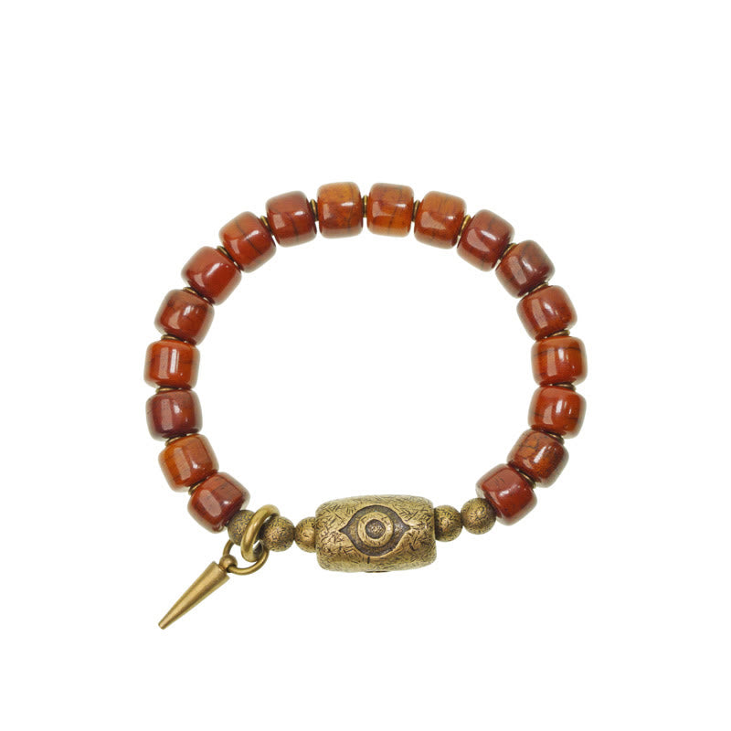 Bracelet de force avec pendentif en forme de cône en cuivre en forme de Dzi en Buddha Stones