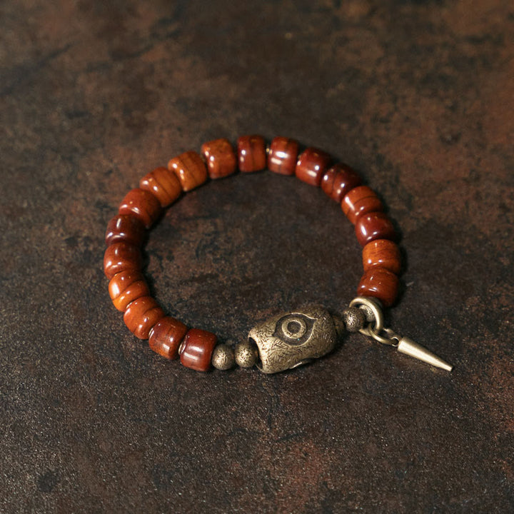 Bracelet de force avec pendentif en forme de cône en cuivre en forme de Dzi en Buddha Stones