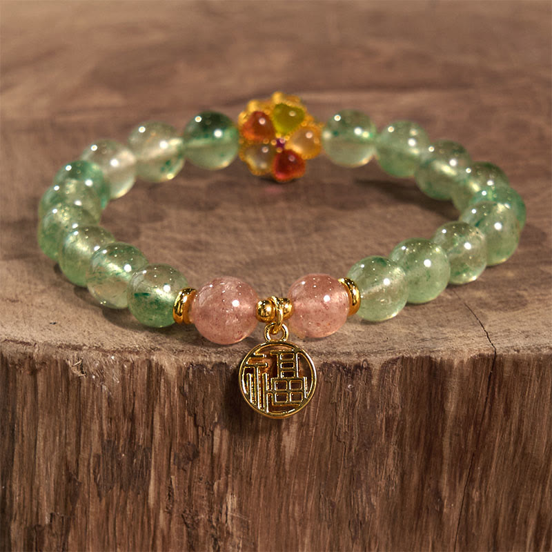 Bracelet de caractère Fu apaisant en quartz vert fraise naturel Buddha Stones