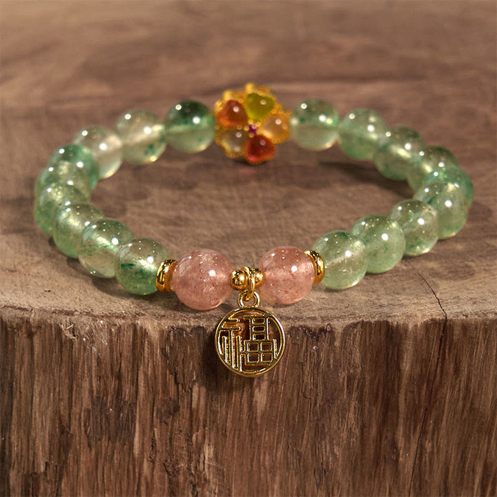 Bracelet de caractère Fu apaisant en quartz vert fraise naturel Buddha Stones
