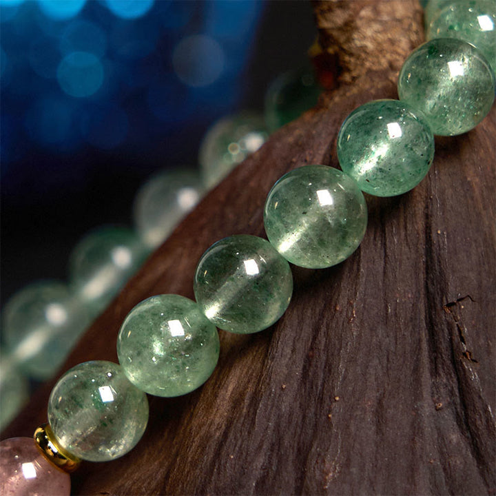 Bracelet de caractère Fu apaisant en quartz vert fraise naturel Buddha Stones